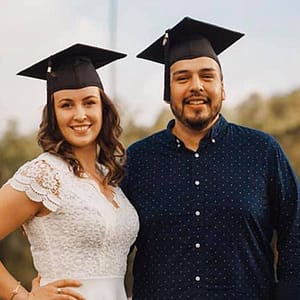 graduates smiling